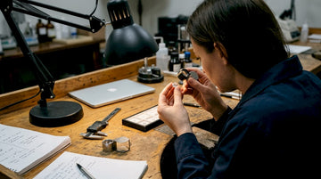 Gemologist inspecting diamond clarity in lab
