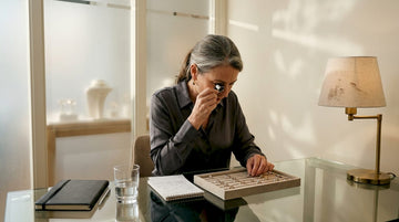 Jeweler reviewing rings at boutique consultation desk